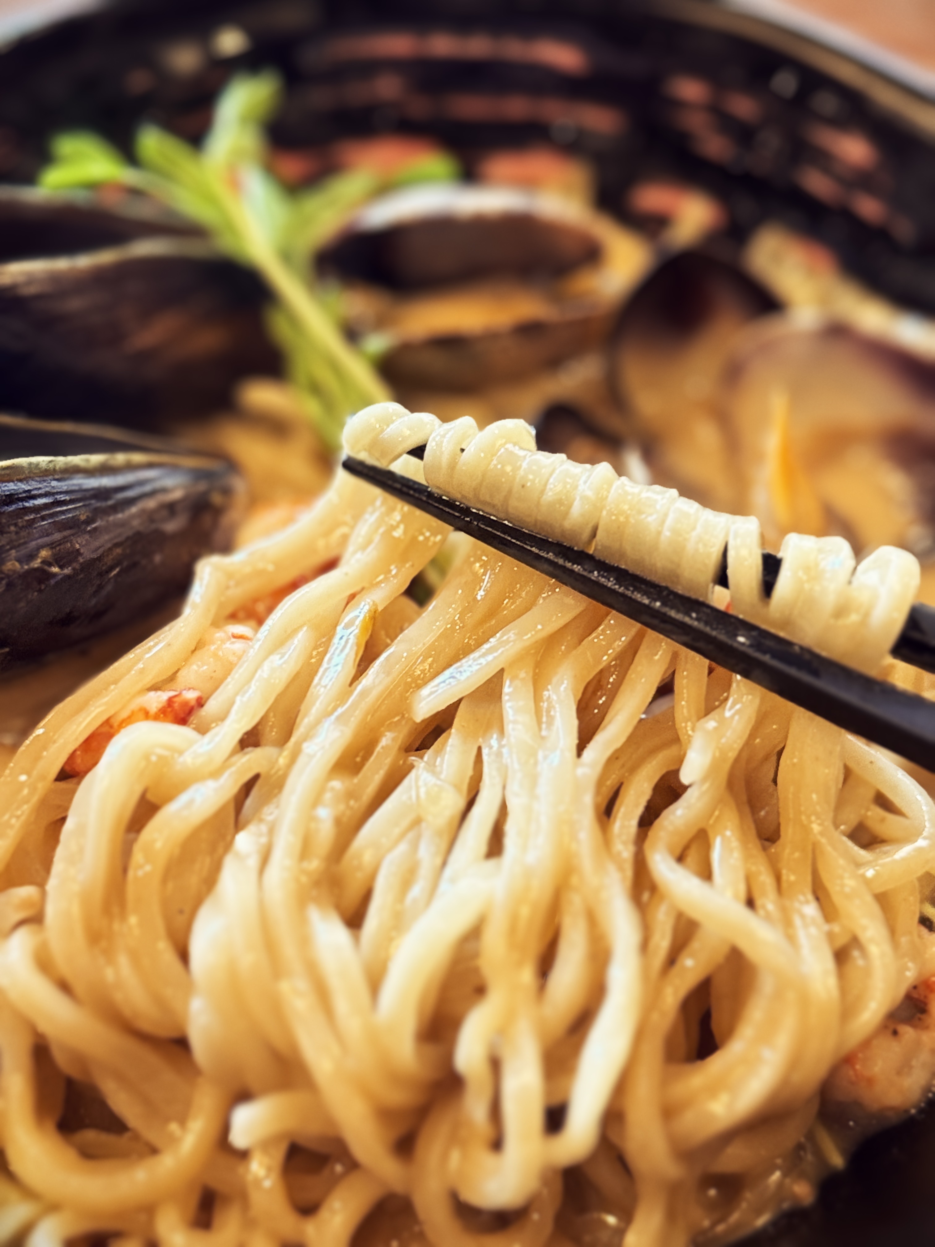 Fresh ramen noodles with clams at Nikkei Ramen-ya